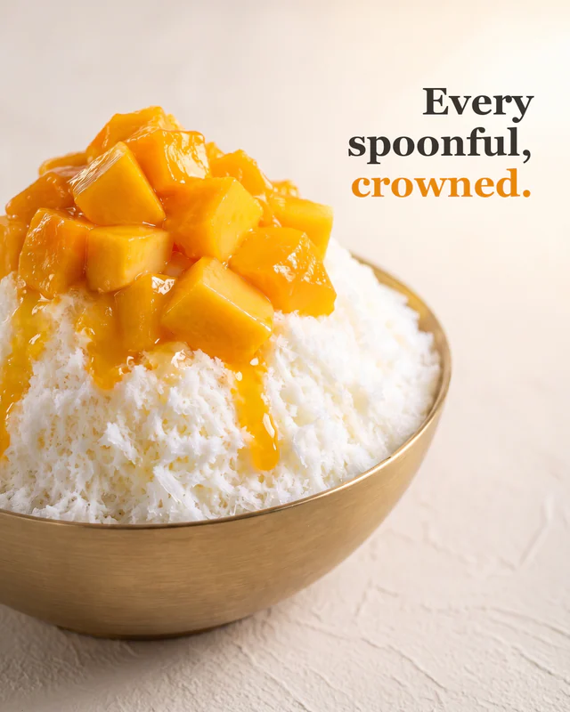 Close-up of glossy mango cubes crowning the shaved ice, headline "Every spoonful, crowned."